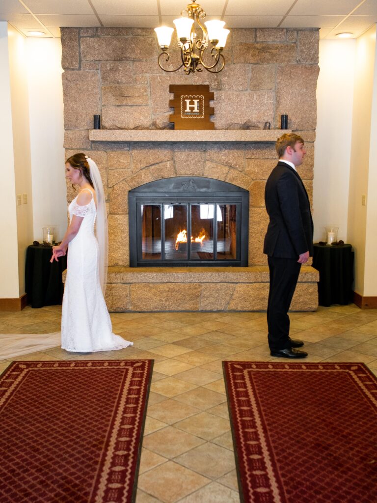 photo of bride and groom facing away from each other